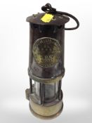 A 19th-century Eccles Type SL miner's safety lamp, together with a further smaller brass example.
