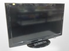 A Panasonic Vierra 32-inch LCD TV, with lead and remote.