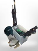 A quantity of fishing rods, landing nets, pair of waders, etc.