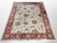 A machine made rug of Zeigler design,