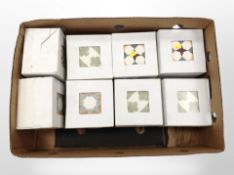 Eight sets of 12 modern glazed tiles.