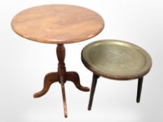A reproduction mahogany circular occasional table,