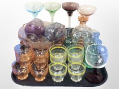A group of coloured glass drinking vessels, bowls, decanter, etc.