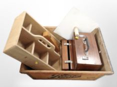 A vintage Boots crate containing multi-division tray, wooden toolboxes, etc.