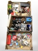 A quantity of fishing reels and equipment, fishing line, lures, floats, etc.