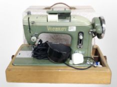 A Viceroy electric sewing machine with lead and pedal.