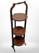 An Edwardian inlaid mahogany cake stand.