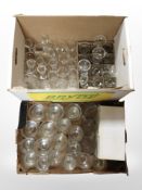 A large quantity of glass ware including etched and gilt drinking glasses, further glasses,