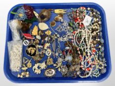 A group of costume jewellery to include necklaces, brooches, animal brooches, etc.