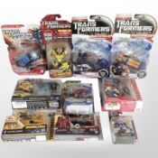 10 Hasbro Transformers figurines, boxed.