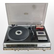 A Sharp stereo music center SG-160H (continental plug).