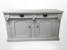 A French-style painted sideboard fitted cupboards and drawers, 150cm wide x 47cm deep x 86cm high.