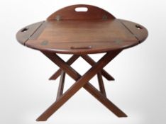 A mahogany butler's tray table, width 73cm.