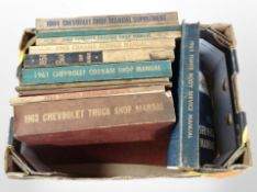 A group of vintage car manuals including Chevrolet, Buick, etc.