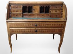 A 19th-century continental inlaid walnut bureau, 111cm wide x 59cm deep x 107cm high (af).