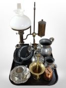 A reproduction brass rise and fall lamp (continental plug),