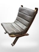 A 20th-century Danish brown leather bentwood relaxer chair, width 66cm x height 90cm.