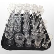 A collection of crystal drinking glasses including set of six air-stem examples, etched examples,