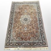 An Isfahan rug, Central Iran, 216cm x 141cm.