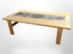A Danish blonde oak rectangular coffee table with tile-inset top,