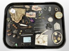 A group of collectibles including lady's evening bag, Queen Elizabeth coronation badges,