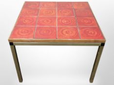 A Scandinavian metal-framed lamp table with tile-inset top, width 63cm.