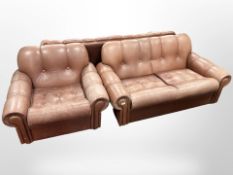 A 20th-century Danish three-piece terracotta leather lounge suite,