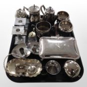 A group of silver-plated wares including rectangular lidded muffin dish on paw feet, salts,