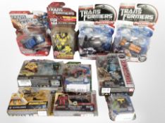 10 Hasbro Transformers figurines, boxed.