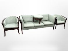 A 20th-century Danish four-piece lounge suite comprising of three-seater settee,