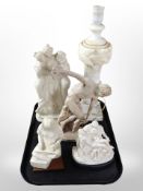 A group of contemporary resin ornaments including The Three Graces, La Pieta, etc.