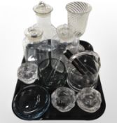 A group of glass wares including three lidded storage jars, large goblet,