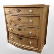 A 19th-century Scandinavian pine bow-front four-drawer chest, 80cm wide x 50cm deep x 85cm high.