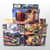 Five Hasbro Disney Star Wars figurines including Rey's Speeder (Jakku), Assault Walker, etc., boxed.