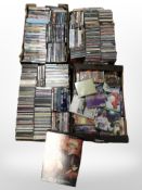 A large quantity of assorted CDs, DVDs, video games, etc.
