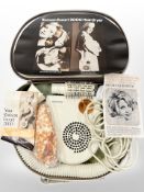 A Ronson Escort 2000 vintage hairdryer, unused, with instruction manual, in original travel case.