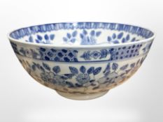 A large Chinese import blue and white bowl, with blossom decoration, no marks to base, height 14 cm,