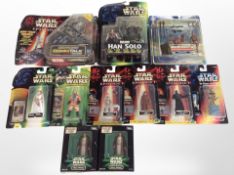 11 Hasbro and Kenner Star Wars figurines including The Phantom Menace, etc., boxed.