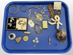 A group of collectibles including costume jewellery identity bracelet, Colibri lighter, compass,