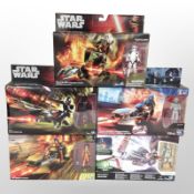 Five Hasbro Disney Star Wars figures including Assault Walker, Elite Speeder Bike, etc., boxed.