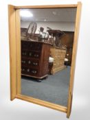 A pine-framed mirror, width 78cm.