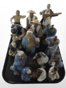 A quantity of Chinese glazed earthenware figures of musicians, elders, etc.