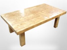 A pine rectangular coffee table, 140cm wide.
