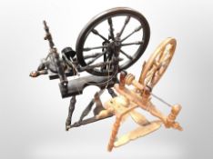 Two 19th-century spinning wheels. CONDITION REPORT: Woodworm throughout.