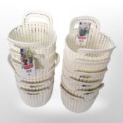 12 Curver plastic twin-handled baskets, new with tags.