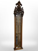 A Victorian oak Admiral Fitzroy's barometer, length 125cm.
