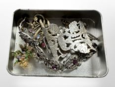 A small group of jewellery including Scottish bracelet decorated with thistles, bar brooches,