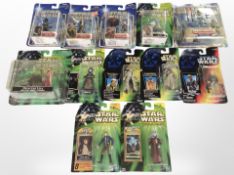 12 Hasbro Star Wars figurines including The Phantom Menace, Return of the Jedi, etc., boxed.