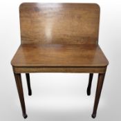 A mahogany turnover-top tea table, width 86cm.