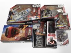 Eight Hasbro and Disney Store Star Wars figurines, boxed.